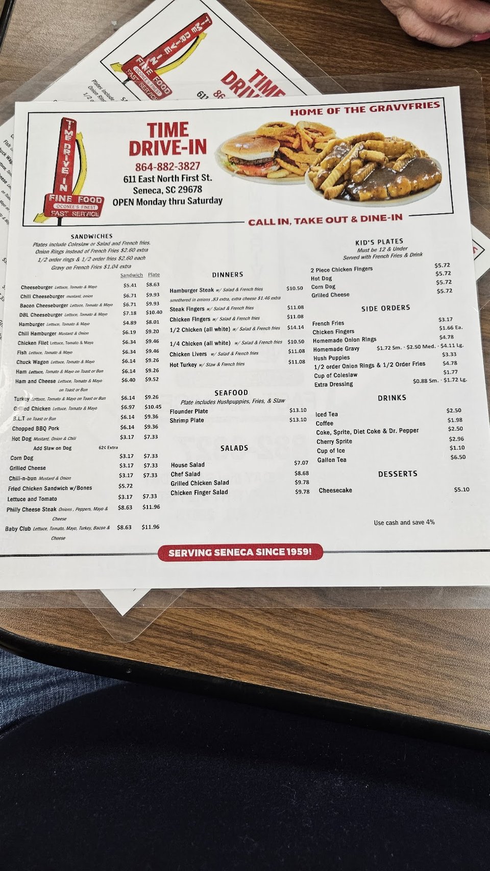 Simple diner menu featuring sandwiches and sides.